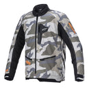 The Alpinestars Venture XT Jacket by ALPINESTARS is a multi-colored Mojave Camo jacket with black accents on the sides and sleeves. It features a zippered chest pocket with a white logo. The sleeves sport orange text near the cuffs, while the high collar and multiple zippered pockets ensure both style and functionality.