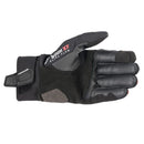 The Alpinestars Hyde XT Drystar XF Gloves by Crown Kiwi Enterprises Limited are sleek black motorcycle gloves with knuckle protection, impact safety, a textured palm grip, and waterproof performance. They feature a stylish wrist logo for an ultimate ride.
