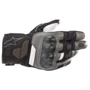 The Alpinestars Corozal Drystar v2 Glove by ALPINESTARS is a black and gray motorcycle glove featuring a carbon-like knuckle protector, textured and smooth materials, wrist branding, abrasion resistance, and ergonomic design for comfort and protection—ideal for every rider.