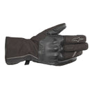 The Alpinestars Tourer W-7 Drystar Gloves by ALPINESTARS are black and gray with a star logo on the index finger. They feature detailed stitching, a wrist adjustment strap, and provide protection and grip while being touchscreen compatible for convenience.