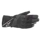 The Alpinestars Andes v3 Drystar Gloves, in black and dark gray with white branding, are made from goat leather for excellent grip. They feature reinforced sections for protection and are touch-screen compatible, offering durability and a perfect mix of style and functionality.