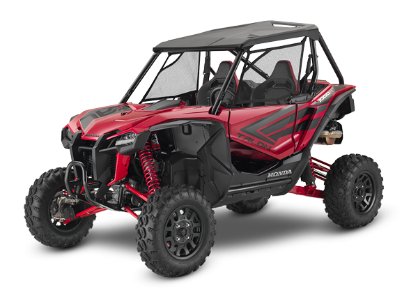 A red Honda Talon R off-road vehicle is pictured. It features robust, large tires, a roll cage, and sporty accents. The vehicle has a rugged design suitable for rough terrain, with visible shock absorbers and a roof for protection—perfect for sport side-by-side enthusiasts.
