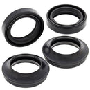 Four black, circular rubber seals in various orientations are pictured against a white background. They appear similar in size and design, with two seals shown at an angle and two presented flat, highlighting their ring-like structure and flexible material. These VERTEX FORK & DUST SEALS PAIR ALL BALLS H CB/CL/CA175 73 are designed for Honda CB/CL/CA175 models.