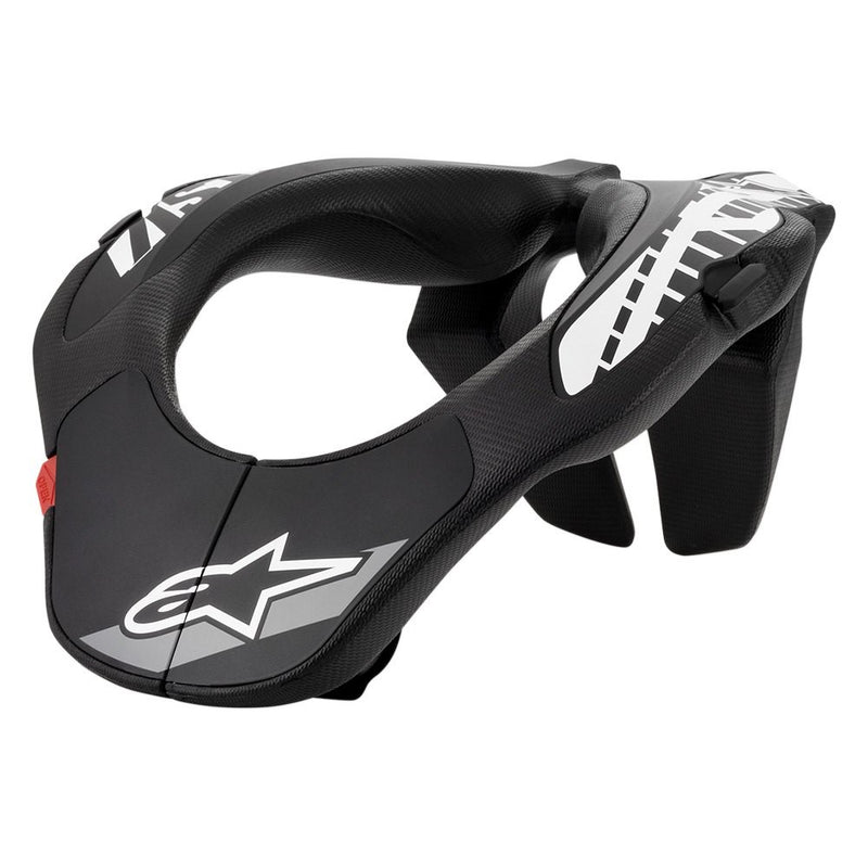 The Alpinestars Youth Neck Support, offered by Crown Kiwi Enterprises Limited, showcases a sleek black and white design with a prominent logo and red accents. This accessory provides contoured, ergonomic support for neck protection, making it perfect for motorsports or extreme sports safety.