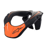An orange and black motorcycle neck brace with an aerodynamic design features a distinctive front logo. The ALPINESTARS Alpinestars Youth Neck Support offers protection and boasts a sleek, modern appearance focused on injury prevention.