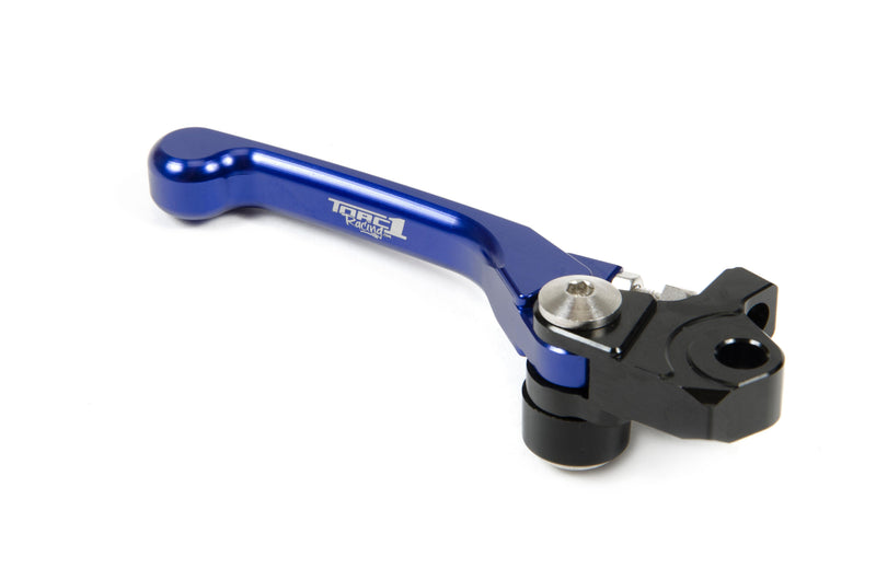 A FRONT BRAKE LEVER TORC1 RACING FLEX for Husqvarna TC85 14-On and TC65 17-On motorcycles is displayed against a white background. This blue lever, paired with a black mounting base, features an ergonomic design emphasizing its CNC construction from durable material. Engraved with "TORC1 Racing," it stands out as a top performance product by TORC1 RACING.