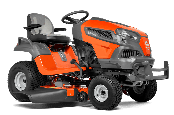 A Husqvarna TS242TXD Ride-On Mower is shown in bright orange, featuring a comfortable gray seat with armrests, large textured tires, and a robust ClearCut™ deck underneath. The side discharge tractor boasts a modern design with the prominent Husqvarna logo on its front.