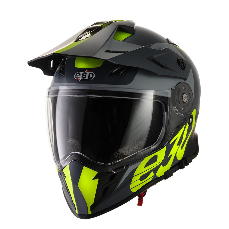 A grey and black ELDORADO ELDORADO E30 FLURO GRAPHIC adventure motorcycle helmet with neon green accents and the letters "e30" on the side. The multi-vented helmet features a clear visor, an integrated sun visor, a sun peak, and visible ventilation ports. The brand logo "ELDORADO" is printed above the visor.