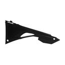 The AIR BOX COVER by RTECH, designed for CRF250R (2018-2020), CRF450RX/CRF450R (2017-2020), and CRF250RX/CRF450L/CRF450X (2019-2020) models, is crafted from black plastic. Its angular and sleek design features precise cutouts and sharp edges, with a small hole at one end indicating attachment points. The product is showcased against a plain white background.