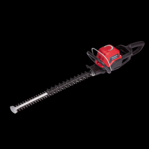 A red and black cordless Honda HHH36 Battery Hedge Trimmer Kit from Honda Power Equipment with a long dual-action blade and ergonomic handle, perfect for gardens. The tool features a safety guard and controls on the top housing.