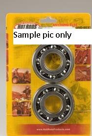 Packaging containing a pair of round metal crank bearings and seals from the "Vertex" brand's CRANK BEARINGS & SEALS KIT for Honda CRF250R 04-05 and CRF250X 05-06. The label features various images and product information in the background with a "Sample pic only" note over part of the packaging.