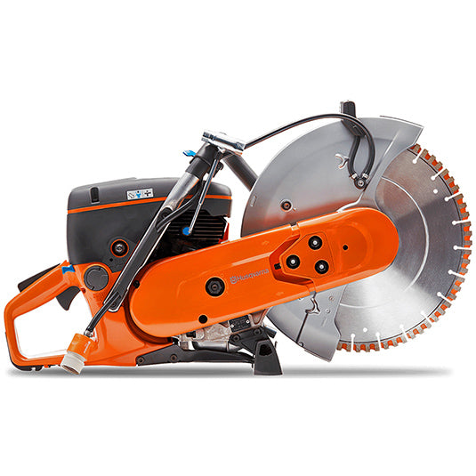 The **Husqvarna K770 Power cutter** featuring an orange and black body with a large circular blade, designed for heavy-duty cutting tasks often required in forestry. The saw has ergonomic handles, a partially covered blade by a silver guard, and the prominent **Husqvarna** logo visible. Perfect for outdoor use.