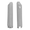 Two white plastic side panels, commonly used for motorcycle fairing, are depicted. One panel has two rectangular cutouts while the other does not. Both panels have mounting holes at the bottom and feature various indents and contours in their design, ideal for FORKPROTECTORS-GUARDS RTECH YZ125 YZ250 98-04 YZ250F YZ400F YZ426F YZ450F WR250F WR400F WR426F 96-04 models from RTECH.