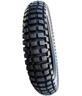 The image shows a close-up view of the MOTOZ TYRE 120 100 18 MOUNTAIN HYBRID off-road motorcycle tire, featuring a rugged, knobby tread pattern made from natural rubber. The tire showcases thick, square knobs designed for enhanced grip and traction on rough or loose surfaces. It is vertically oriented against a white background.