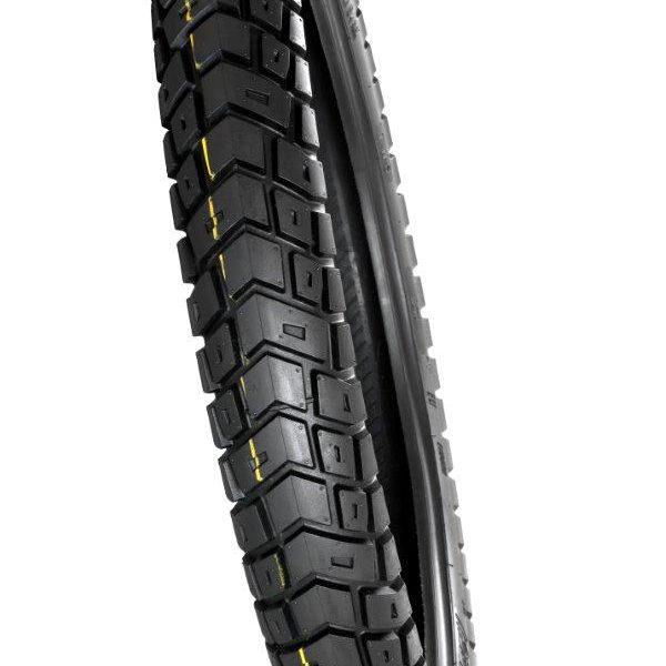 Image of the TYRE 120/70-19 MOTOZ GPS featuring a rugged tread pattern designed for traction. The tyre has alternating rectangular and square tread blocks, with two yellow lines running along the surface to indicate its type or usage specifications. Ideal for long mileage, this model ensures smooth transitions from pavement to gravel to dirt.