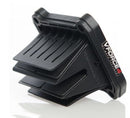 The image shows a black MOTO TASSINARI V FORCE 4 REED VALVE KIT for BETA250RR 13-17, 300RR 13-17, X TRAINER250, XTRAINER300 15-17, and KTM250SX 03-16. The system has a rectangular housing with multiple reed petals and features the VForce4 logo on the side. The device boasts a sleek, modern design with pronounced, angular components that optimize air velocity.