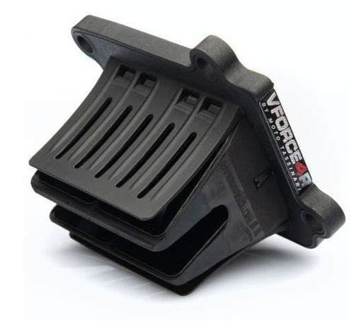 A close-up view of a V FORCE 4R REED KIT YAMAHA YZ125X 19-21 YZ125 05-22 motorcycle reed valve system by MOTO TASSINARI, highlighting its carbon fiber reed petals designed for increased airflow. The device is made from dark materials with multiple vertically aligned slots. The product brand name is visible on the side edge against a plain white background.