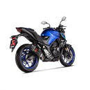 The Akrapovic Slip On Muffler MT03/YZF-R3 by AKRAPOVIC is a sleek black carbon fiber design with a metallic tip and mounting brackets. Featuring a red and yellow logo sticker, this expertly crafted exhaust tuning component is showcased against a plain white background for elegance.