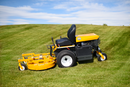 A bright yellow industrial lawn mower, the Walker B27i Zero Turn Mower, with black handles, a comfortable black seat, and large rear wheels. Its robust design features a cutting deck in the front and offers zero-turn capability, making it suitable for heavy-duty landscaping tasks.