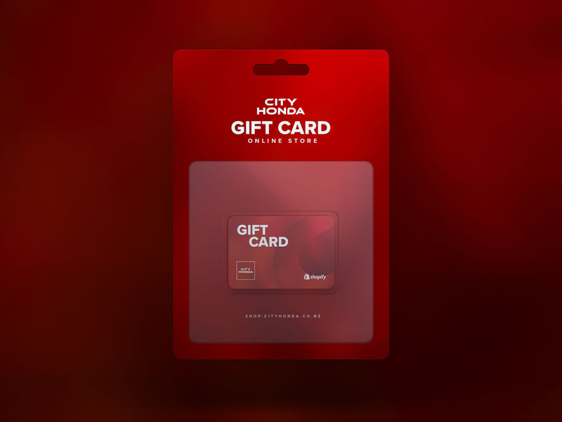 A red City Honda Manawatu Online Gift Card (From $10 up to $500) packaging for an online store. The packaging features a transparent window showing the enclosed gift card. The text reads "City Honda Manawatu Online Gift Card (From $10 up to $500) Online Store" and provides a link to shop.cityhonda.co.nz at the bottom, perfect for online purchases and giving the gift of choice.