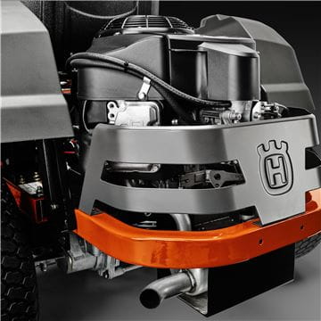 A prominently displayed Husqvarna Z248F Zero Turn lawn mower in bright orange, black, and gray catches the eye. It boasts a comfortable seat with armrests, dual steering levers for precision control, and large rear wheels that ensure easy maneuverability. The wide mower deck is ideal for extensive lawn care, and it comes with a 5-year warranty.