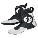 The Alpinestars Tech-8 Inner Shoe by Crown Kiwi Enterprises Limited is a pair of black and white racing boots available in size 6. They feature a sleek design with circular emblem, mesh panels for breathability, and Velcro straps for a secure fit, ensuring comfort and high performance.