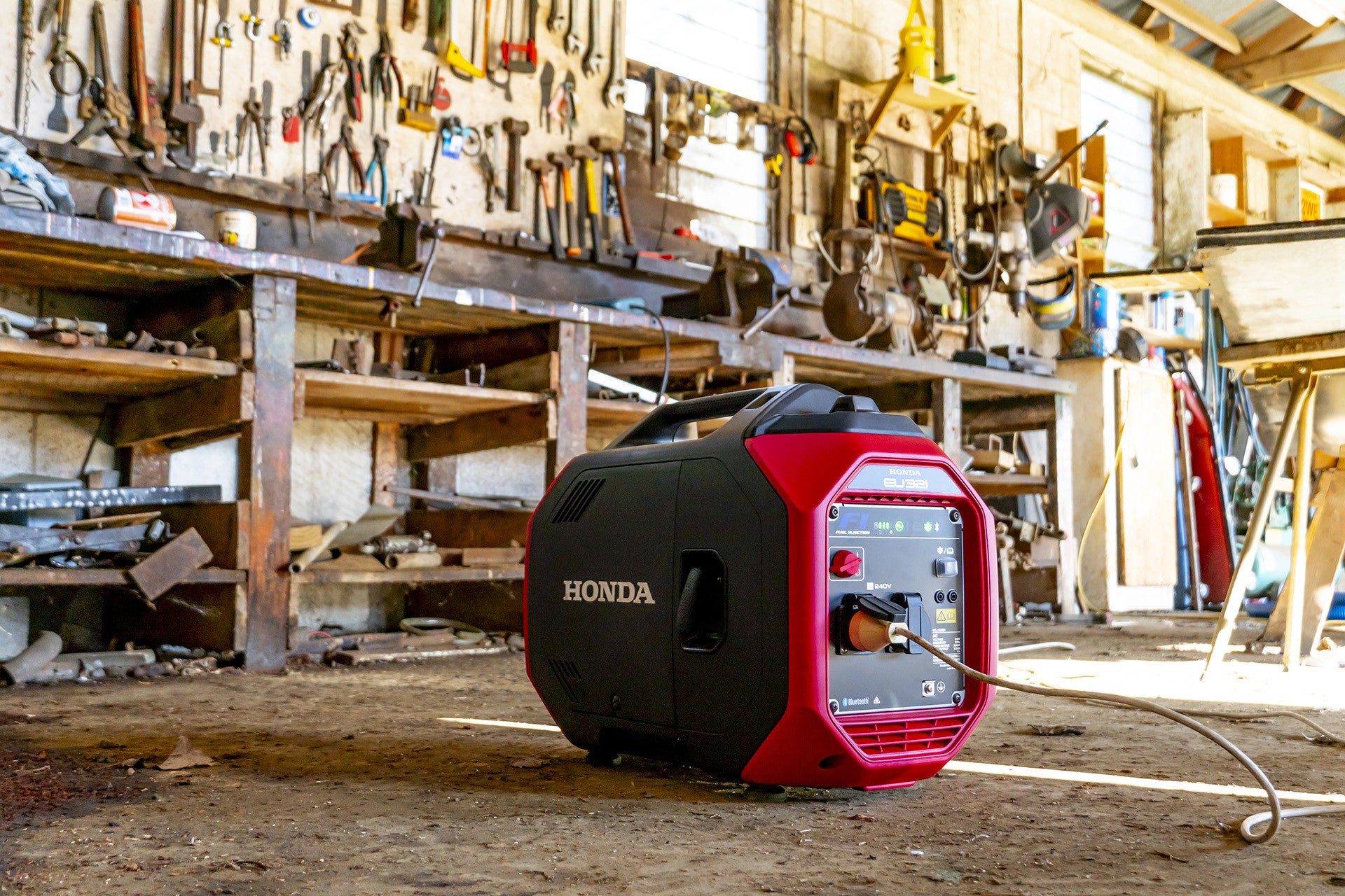 A promotional image for the Honda Power Equipment Honda EU32i Inverter Generator, now at $4,999 including GST. This powerful generator boasts a GX130 fuel-injected engine, 3200W max output, Bluetooth app integration, and weighs just 26.5kg. Enjoy a special $400 discount!