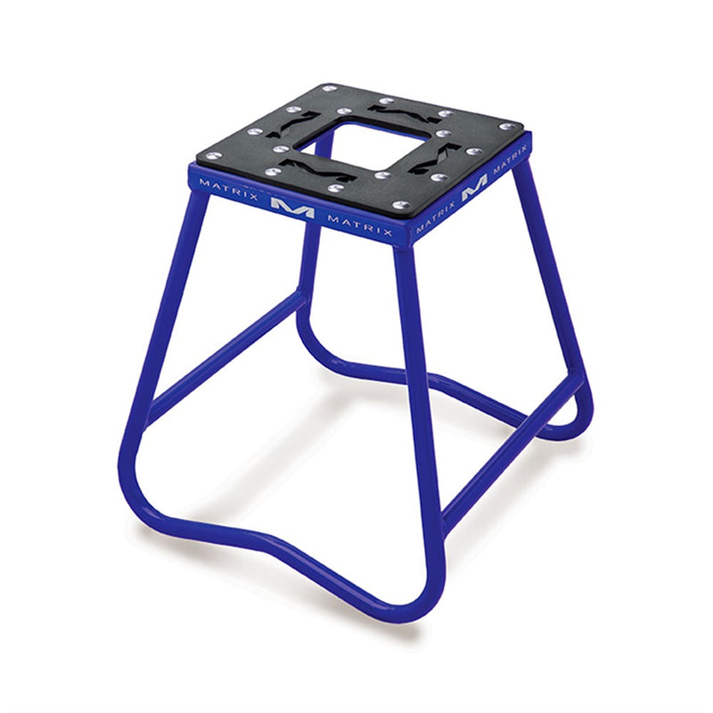 Introducing the MATRIX C1 Steel Stand Blue, a remarkable creation by Crown Kiwi Enterprises Limited. This expertly crafted motorcycle stand features durable carbon steel with a sophisticated black top and a square opening in the center. Its trapezoidal side design highlights its robust construction, complete with a powder-coated finish and the "MATRIX" brand printed prominently on the frame.