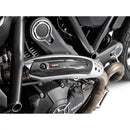The Akrapovic Heat Shield Ducati Carbon by AKRAPOVIC is a sleek black carbon-fiber shield with a textured finish, designed with two mounting holes and an eye-catching red and white Akrapovic logo at its center. The glossy surface highlights the intricate carbon fiber weave pattern, significantly elevating your bike's aesthetic, particularly when combined with Slip-On Line exhaust systems.