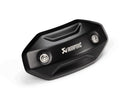 The Akrapovic Heat Shield Trident 660 by AKRAPOVIC is a black coated stainless steel cover with a sleek, slightly curved design and two visible screws. It features the engraved AKRAPOVIC logo, making it an ideal match for the Triumph Trident 660.