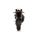 The Akrapovic Muffler Aprilia RSV4/Tuono by AKRAPOVIC showcases a sleek carbon fiber Slip-On Line exhaust system with a metallic mid-pipe and features a logo with a red "A" and the word "Akrapovič." The exhaust pipe boasts a glossy black finish adorned with geometric patterns, delivering the signature Akrapovič sound. It is positioned horizontally on a white background.