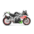 A sleek Akrapovic Muffler Aprilia RSV4/Tuono in black and silver, featuring the AKRAPOVIC brand's logo prominently displayed. This slip-on exhaust system boasts a carbon fiber texture and a curved metal connector, making it ideal for Aprilia motorcycles. The background is plain white.