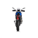 The Akrapovic Slip On Tuareg 660 2022-23 by AKRAPOVIC is a silver titanium motorcycle exhaust with dual outlets and an upward-angled dark carbon fiber tip, offering a sleek look and enhanced durability. The brand name is prominently displayed on the side.