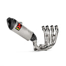 The Akrapovic Full System BMW S1000RR 19-23 by AKRAPOVIC boasts a sleek metallic design with multiple curved pipes and a black end cap. Featuring the standout logo—a red "S" on a yellow background—it exudes style and efficiency against a plain white backdrop.