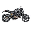 The Akrapovic Ducati Monster 821/1200 & S, a sleek black slip-on exhaust silencer by AKRAPOVIC, features a carbon fiber tip, silver accents, mounting bracket, and the brand logo on the side.