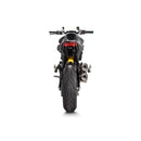 The Akrapovic Ducati Monster 937 2021-23 Slip-On exhaust pipes feature a sporty red and black logo, sleek metallic design, and the signature AKRAPOVIC sound. They are displayed angled beside each other on a white background, complementing motorcycles.