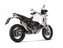 The Akrapovic Ducati Desert-X 2023 features a sleek metallic titanium exhaust pipe with a carbon fiber tip and heat shield. The AKRAPOVIC logo is prominently displayed, boasting an aerodynamic muffler design that enhances performance and aesthetics.