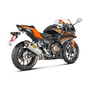 The Akrapovic Slip On Muffler for Honda CBR500 features a silver exhaust with a carbon tip, delivering the signature Akrapovič sound and displaying the AKRAPOVIC red and yellow logo on the side.