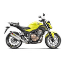 The Akrapovic Slip On Muffler for Honda CBR500 features a silver exhaust with a carbon tip, delivering the signature Akrapovič sound and displaying the AKRAPOVIC red and yellow logo on the side.