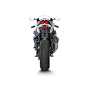 The Akrapovic Slip On Muffler GSX-R1000 by AKRAPOVIC is a sleek, silver exhaust pipe with a black tip and the iconic red and yellow logo, embodying superior titanium craftsmanship for enhanced performance.