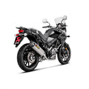 A sleek AKRAPOVIC Slip On V-Strom 650 17-23 with a silver metallic finish and carbon fiber tip features its logo on the curvy titanium muffler, set against a plain white background.