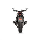 A sleek Akrapovic Slip On Speed Twin/Thruxton exhaust system featuring metallic edges is showcased against a white background. The AKRAPOVIC logo is visible on one of the dual pipes, promising its signature sound.
