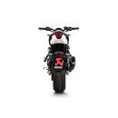 The Akrapovic Full System Trident 660 22-23 by AKRAPOVIC features a sleek design with a matte black silencer and shiny silver pipes. It has four curved pipes merging into one, providing power gains, a modern high-performance look, and a unique sound experience on every ride.