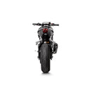 The Akrapovic Slip On for Triumph Street Triple features a carbon-fiber finish, metallic pipe, and is branded with a red "S" logo. This design enhances the AKRAPOVIC sound for an exhilarating ride.