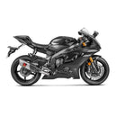 A silver motorcycle exhaust system with a black and red logo, featuring four exhaust pipes converging into a single muffler. The AKRAPOVIC Akrapovic Full System YZF-R6 2007-23 enhances engine performance, complete with a heat shield and sleek design.