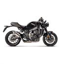 The Akrapovic Full System XSR900 22-23 by AKRAPOVIC, set against a white background, features a sleek cylindrical muffler emblazoned with the brand logo and elegant pipes. This stainless steel creation blends neo-retro style with high performance.