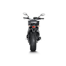 The Akrapovic Full System for Yamaha MT09/XSR900 by AKRAPOVIC is a racing exhaust with a sleek metallic finish, featuring multiple curved pipes leading to a black carbon fiber muffler adorned with a red and yellow logo.